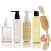 Elevate your self-care routine with the Nara Signature Bundle. This comprehensive set includes hair oil with biotin, skin boost body oil, intimate oil, an anti-cellulite body brush, a bamboo hair brush, and a scalp massager. Nourish and revitalize your hair, skin, and body with this luxurious bundle.